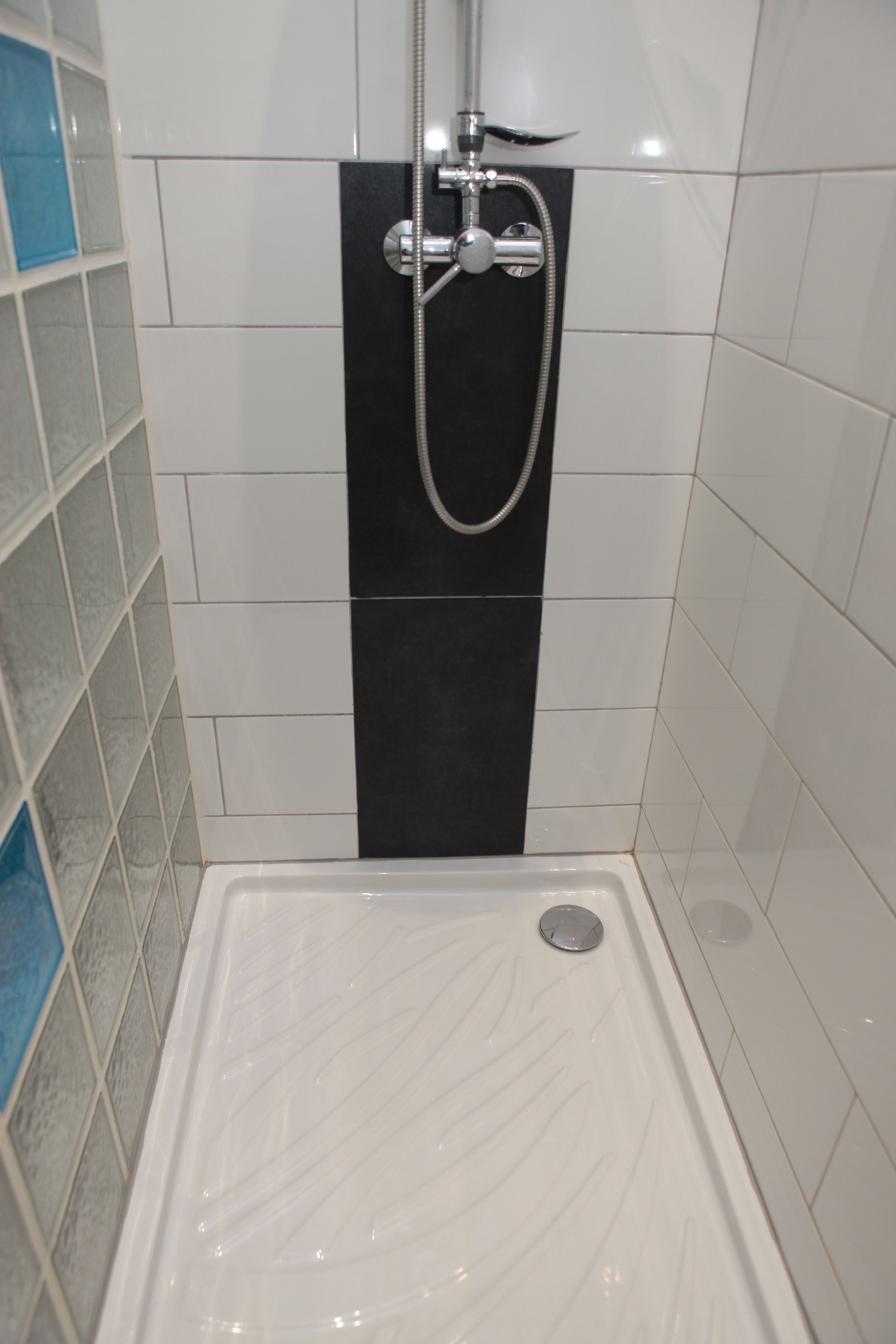 superior quadruple room | bathroom | shower, free toiletries, hair dryer, towels