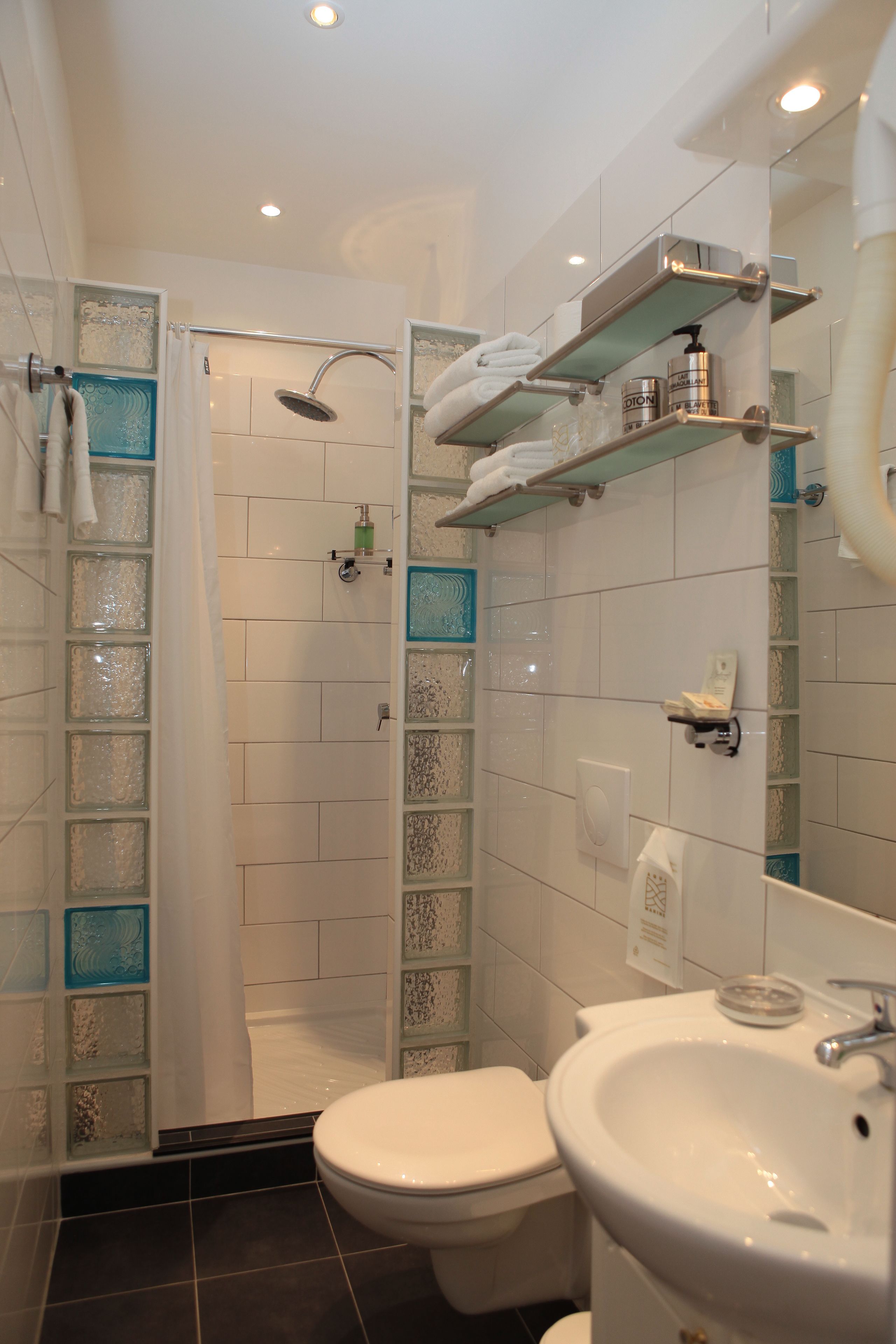 superior double room | bathroom | shower, free toiletries, hair dryer, towels