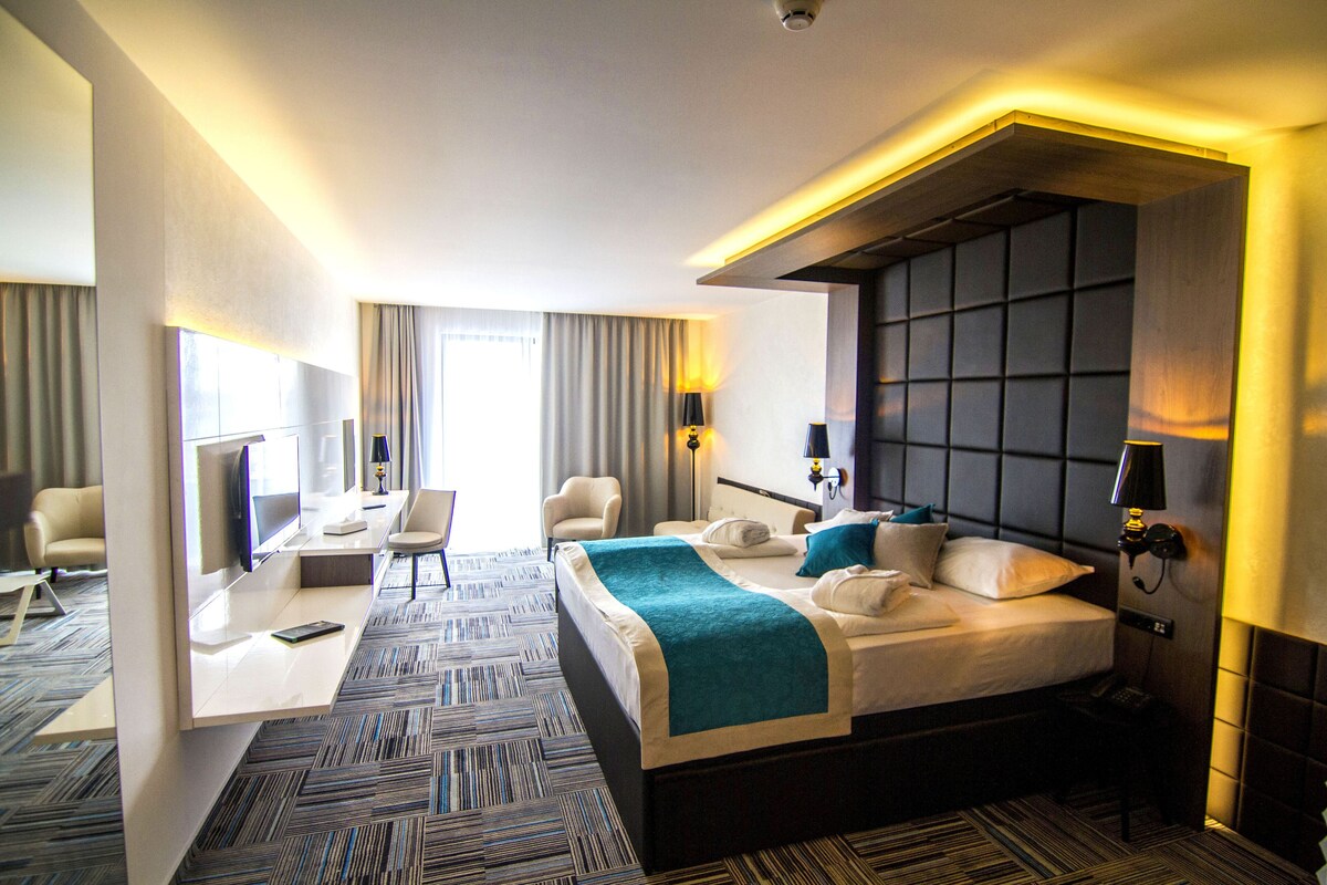 Premium bedding, minibar, in-room safe, desk