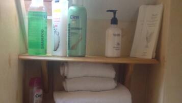 Shower, free toiletries, hair dryer, towels