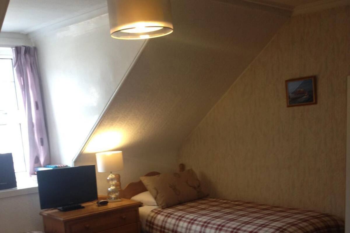 Economy Quadruple Room, Shared Bathroom | Iron/ironing board, WiFi (free), bed sheets