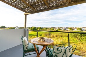 Luxury Double or Twin Room, 1 King Bed, Balcony, Partial Ocean View | Terrace/patio