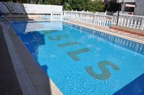 Outdoor pool, pool umbrellas, pool loungers