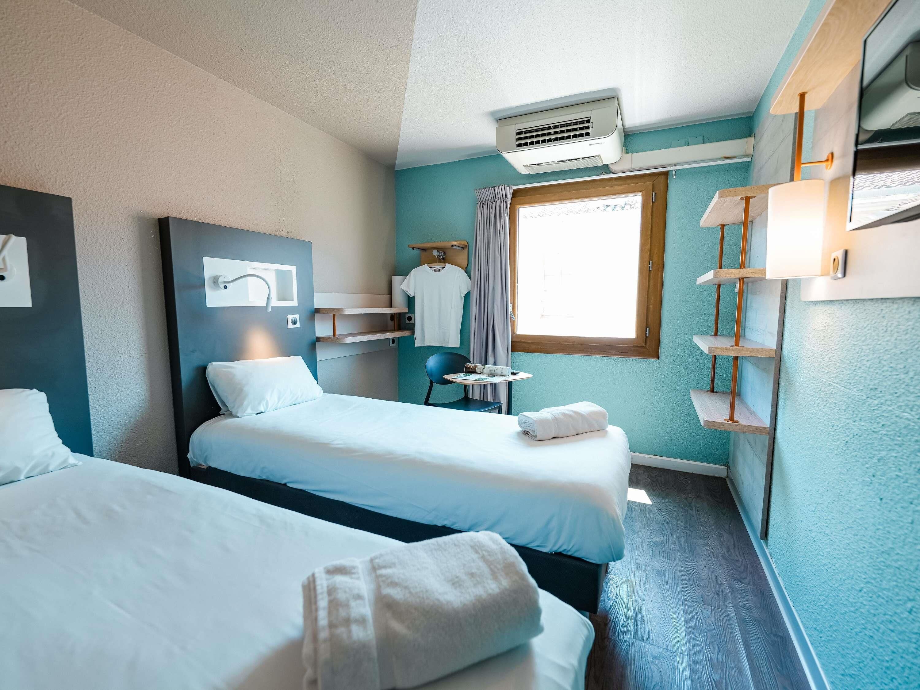 雙床房, 2 張單人床 | 免費嬰兒床、免費 Wi-Fi、床單