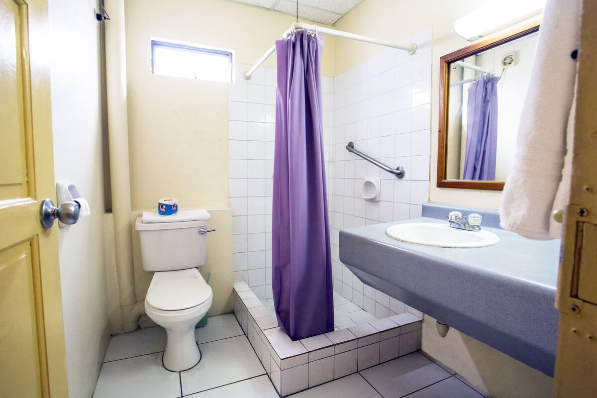 economy single room, 1 bedroom, kitchenette | bathroom | shower, free toiletries, hair dryer, towels