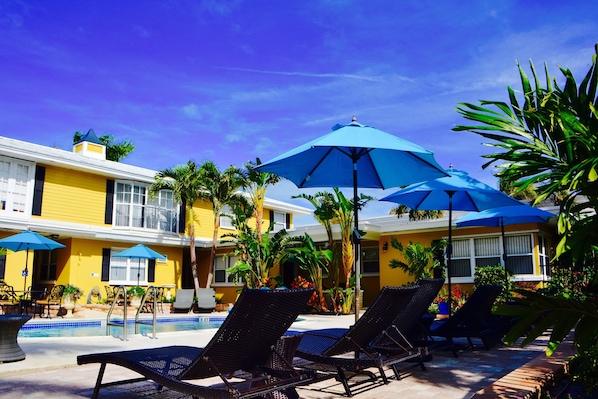 12 outdoor pools, pool loungers