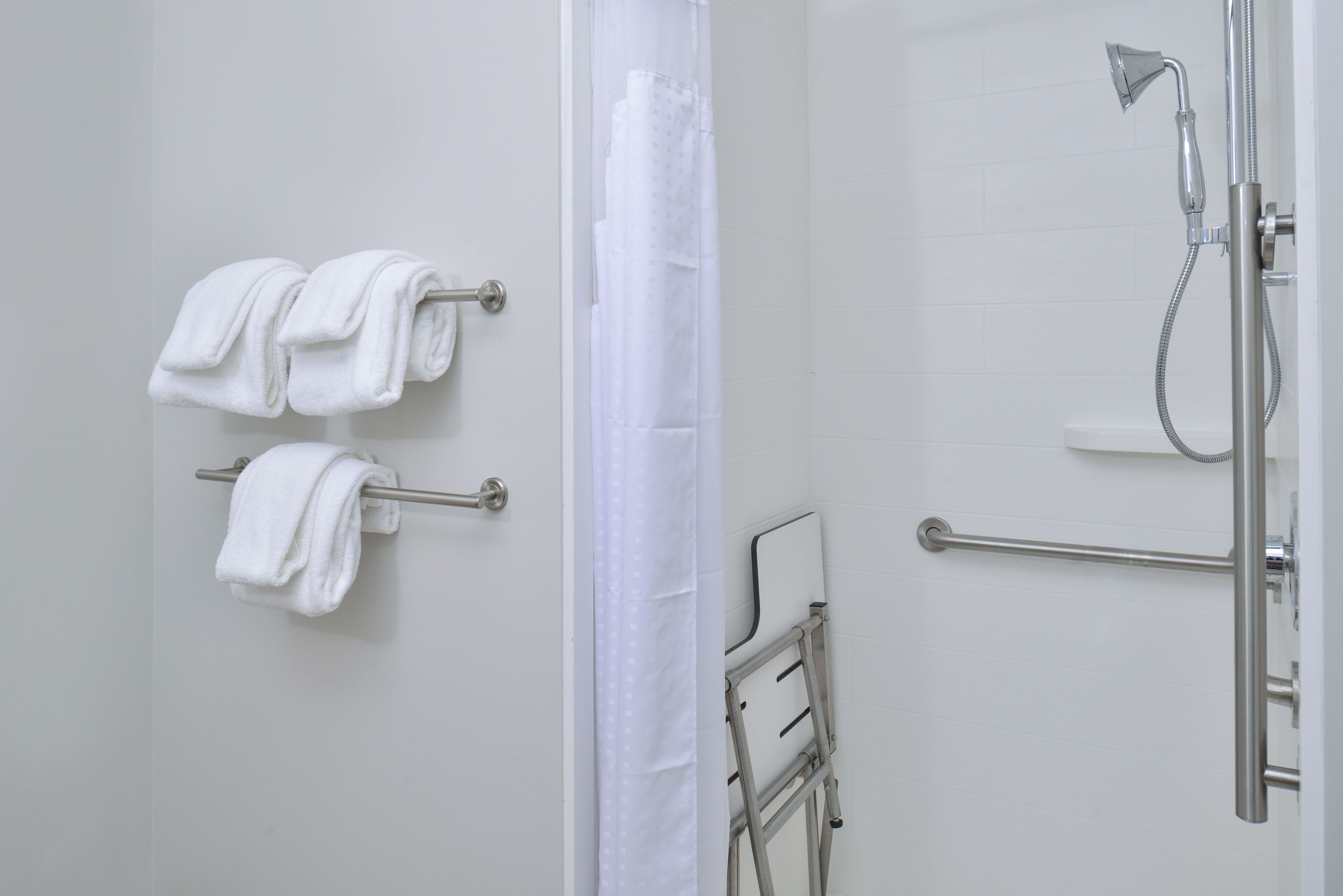 suite, 1 king bed, accessible (communication, transfer shower) | bathroom | free toiletries, towels, soap, shampoo