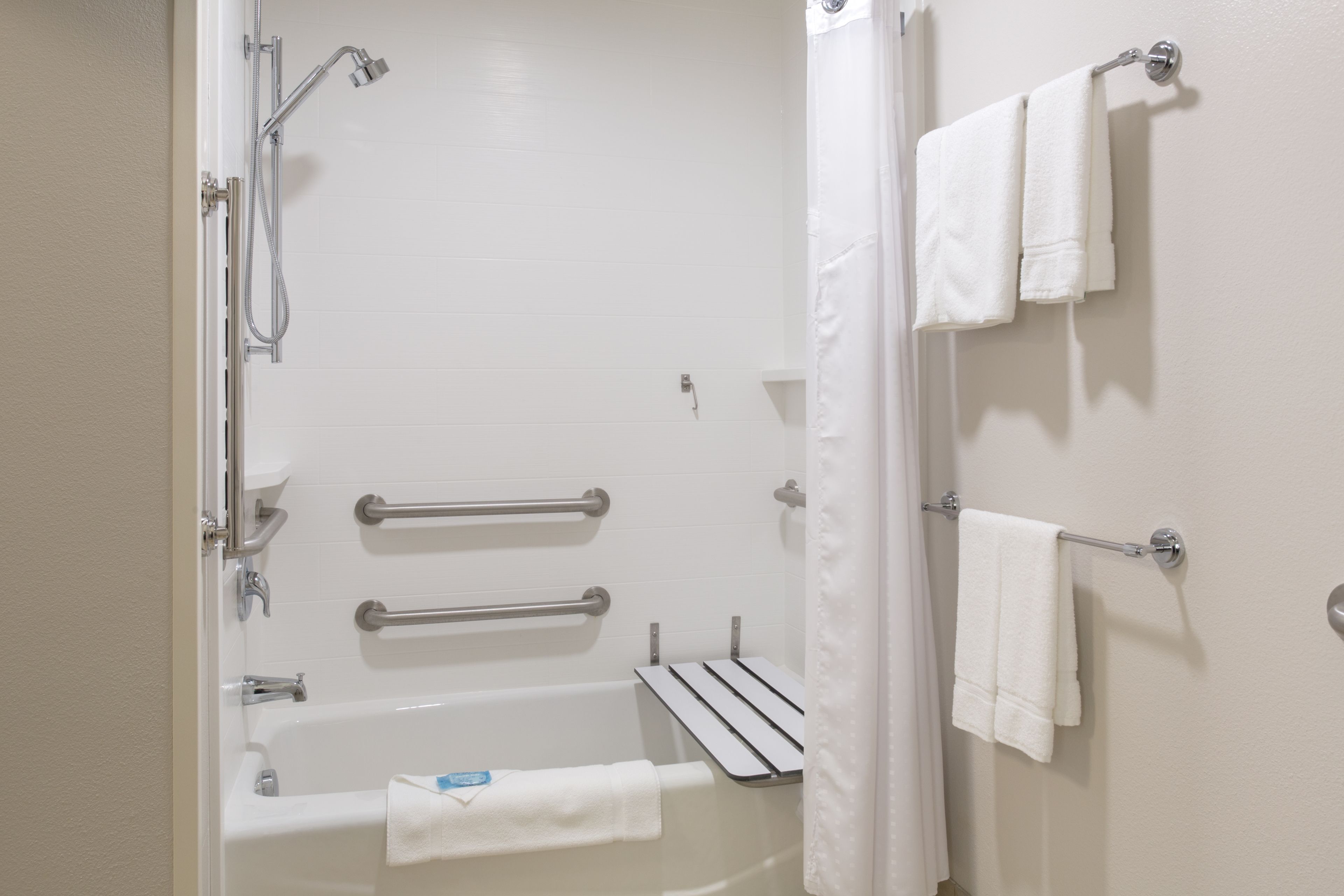 combined shower/bathtub, free toiletries, hair dryer, towels
