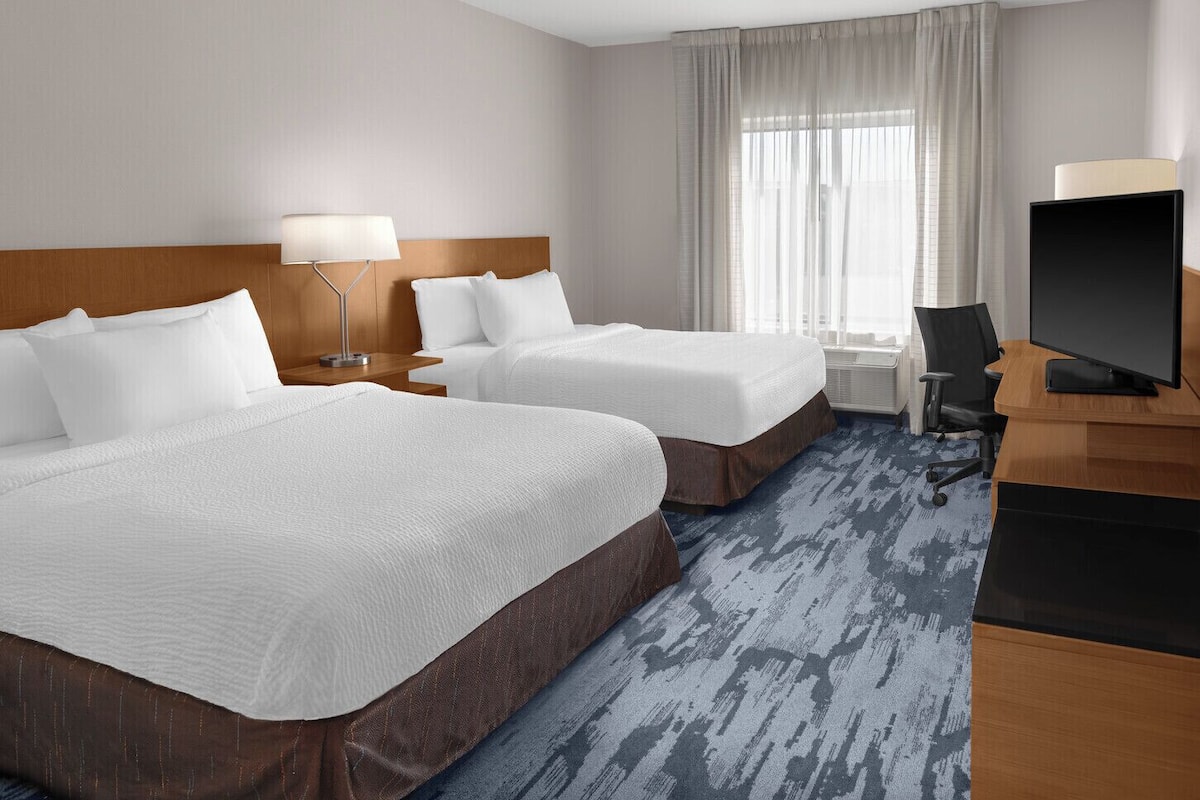 Desk, blackout curtains, iron/ironing board, free cots/infant beds