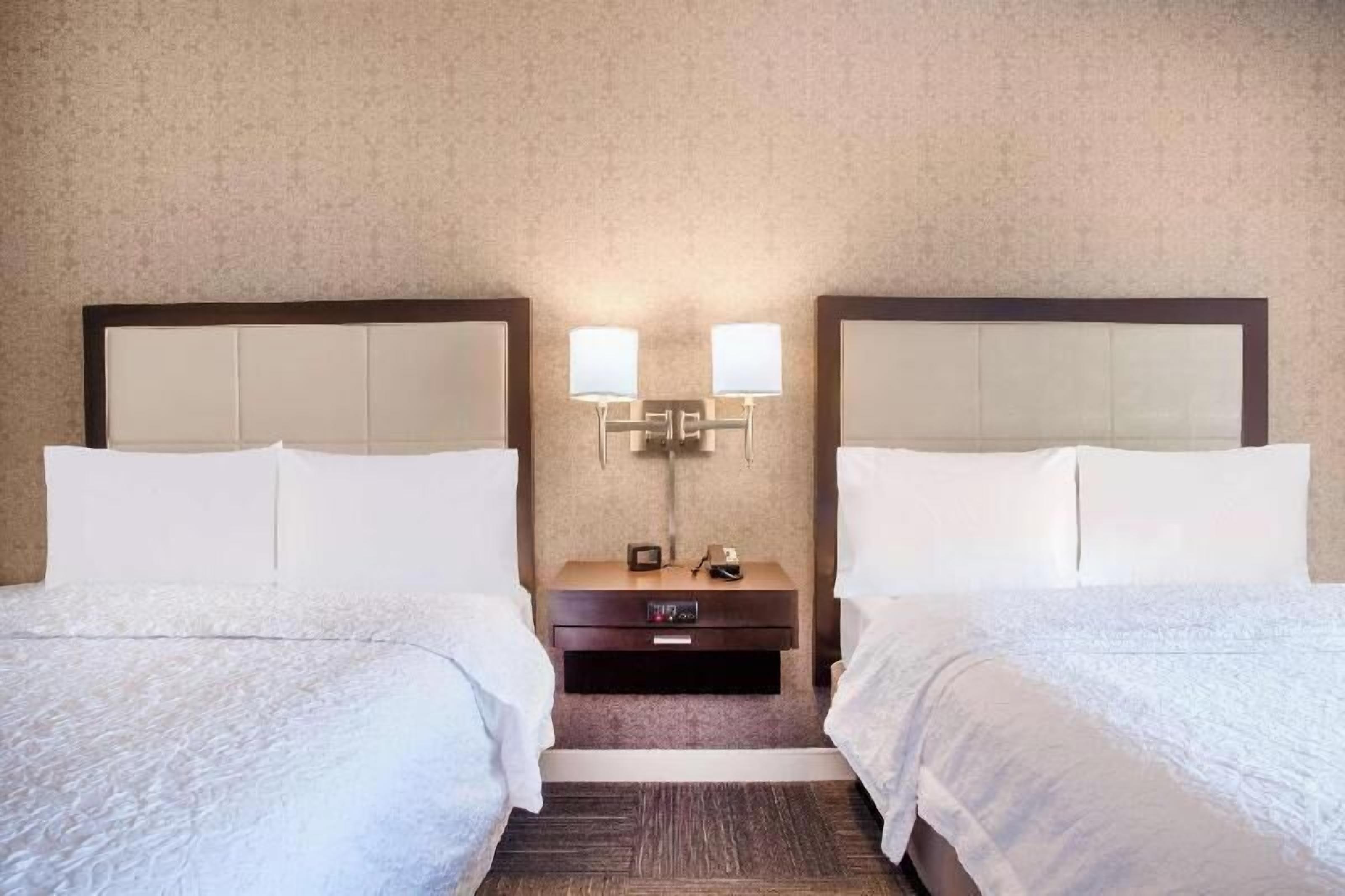 Premium bedding, down comforters, pillowtop beds, in-room safe