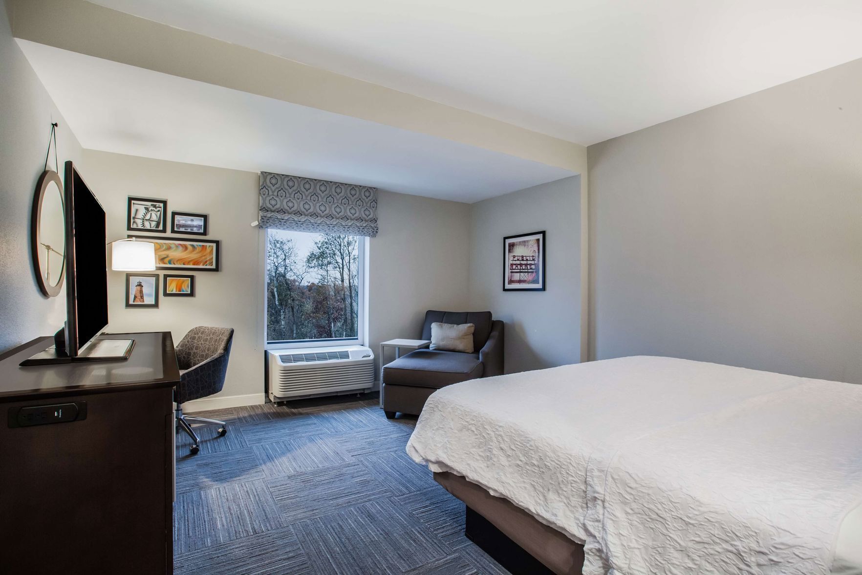 Premium bedding, down comforters, pillowtop beds, in-room safe