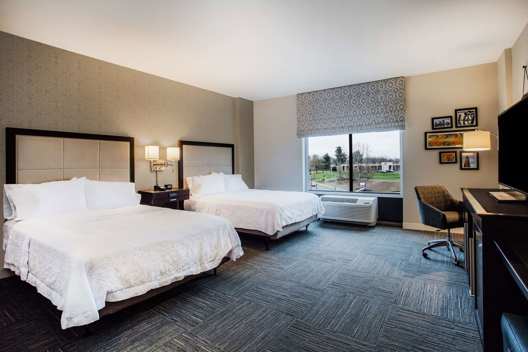 Premium bedding, down comforters, pillowtop beds, in-room safe