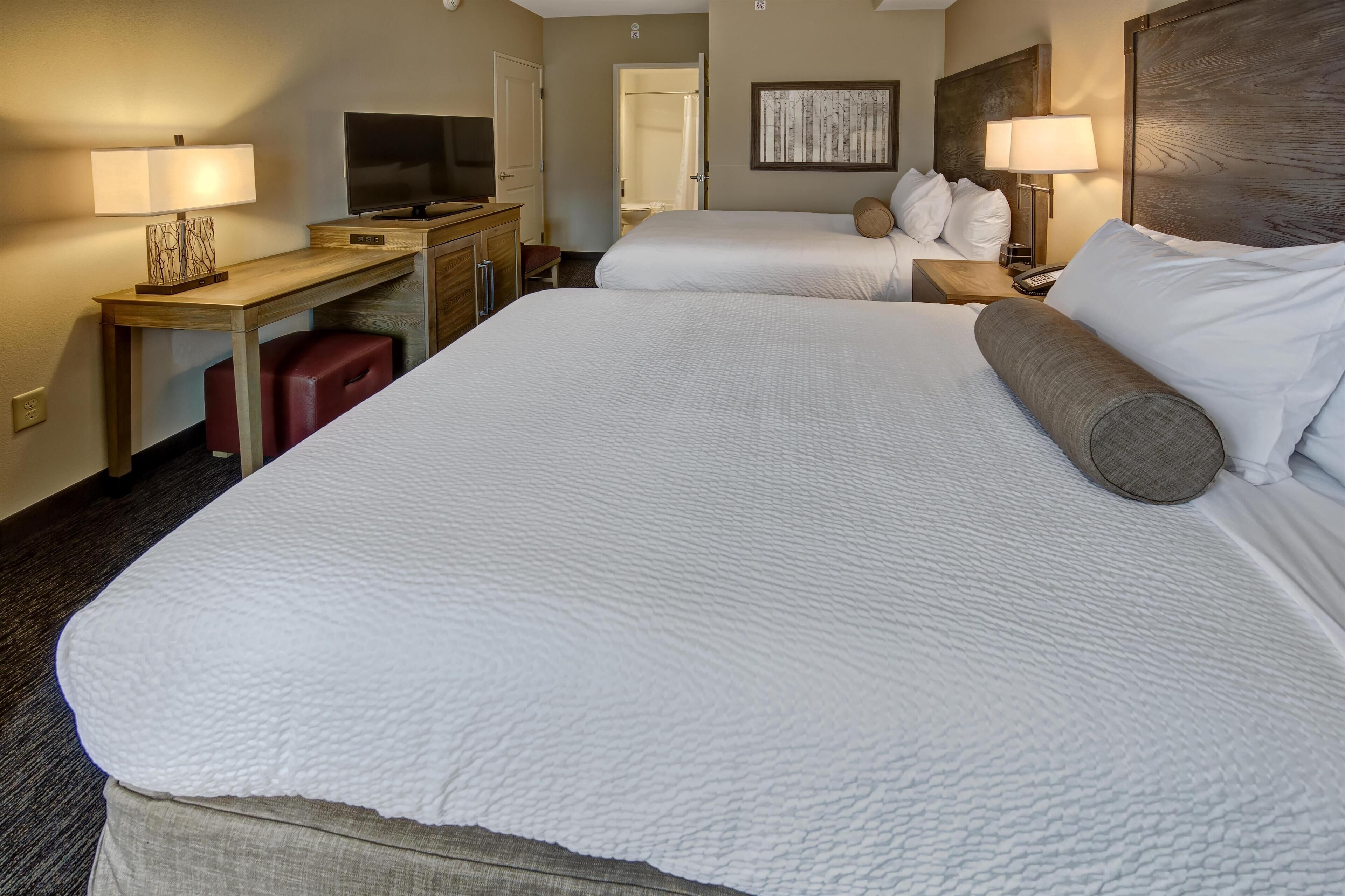 Premium bedding, blackout drapes, iron/ironing board