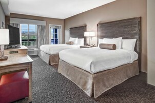 Premium bedding, blackout curtains, iron/ironing board