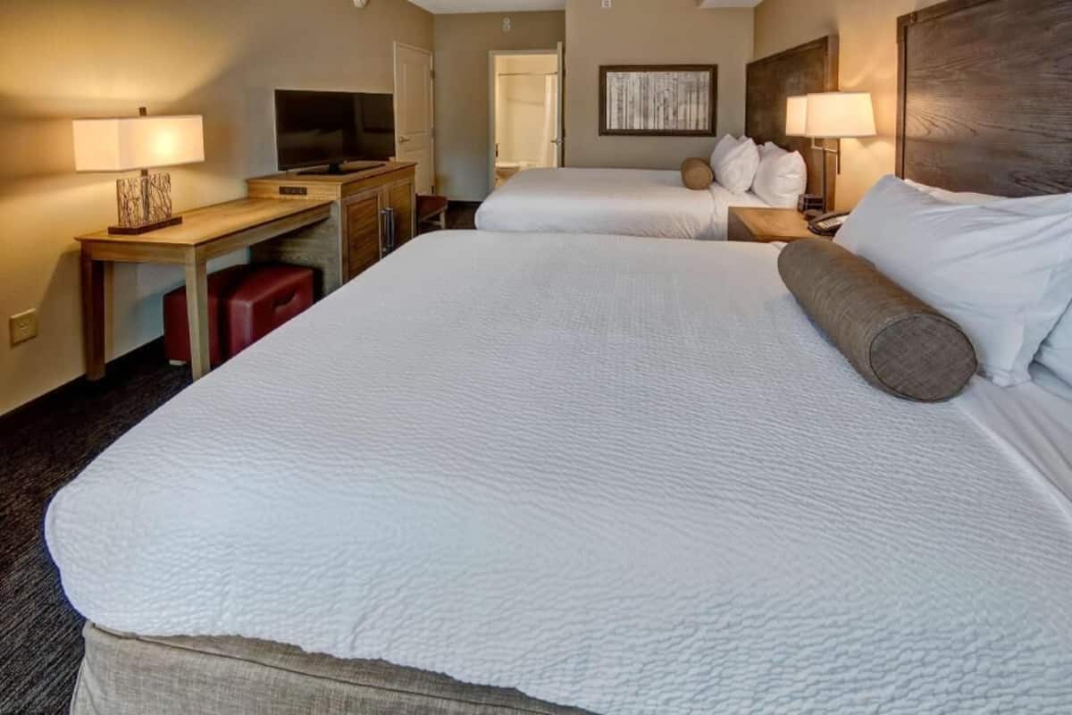 Premium bedding, blackout drapes, iron/ironing board