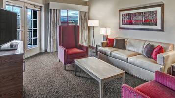 Premium bedding, blackout curtains, iron/ironing board