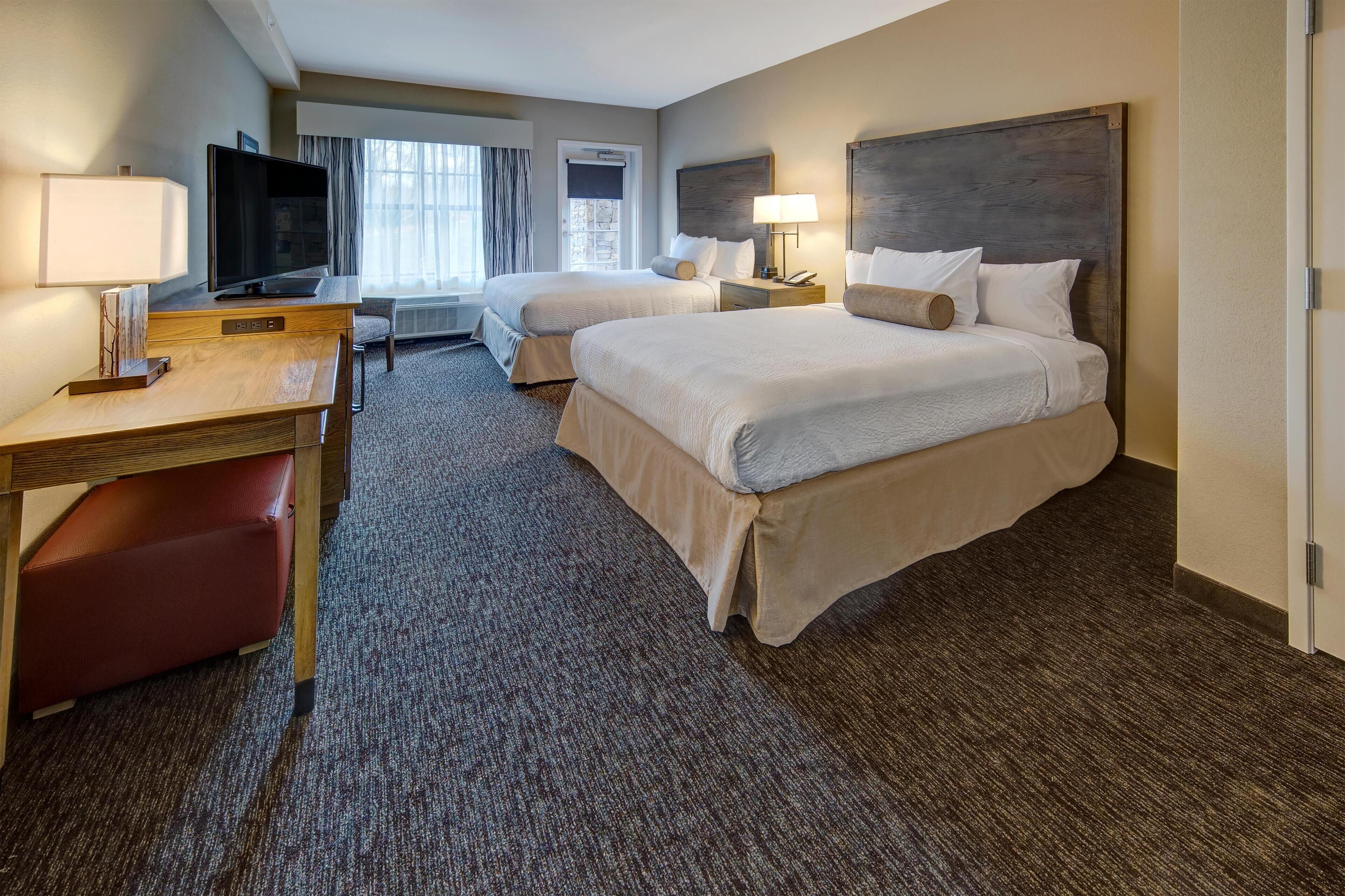 Premium bedding, blackout drapes, iron/ironing board