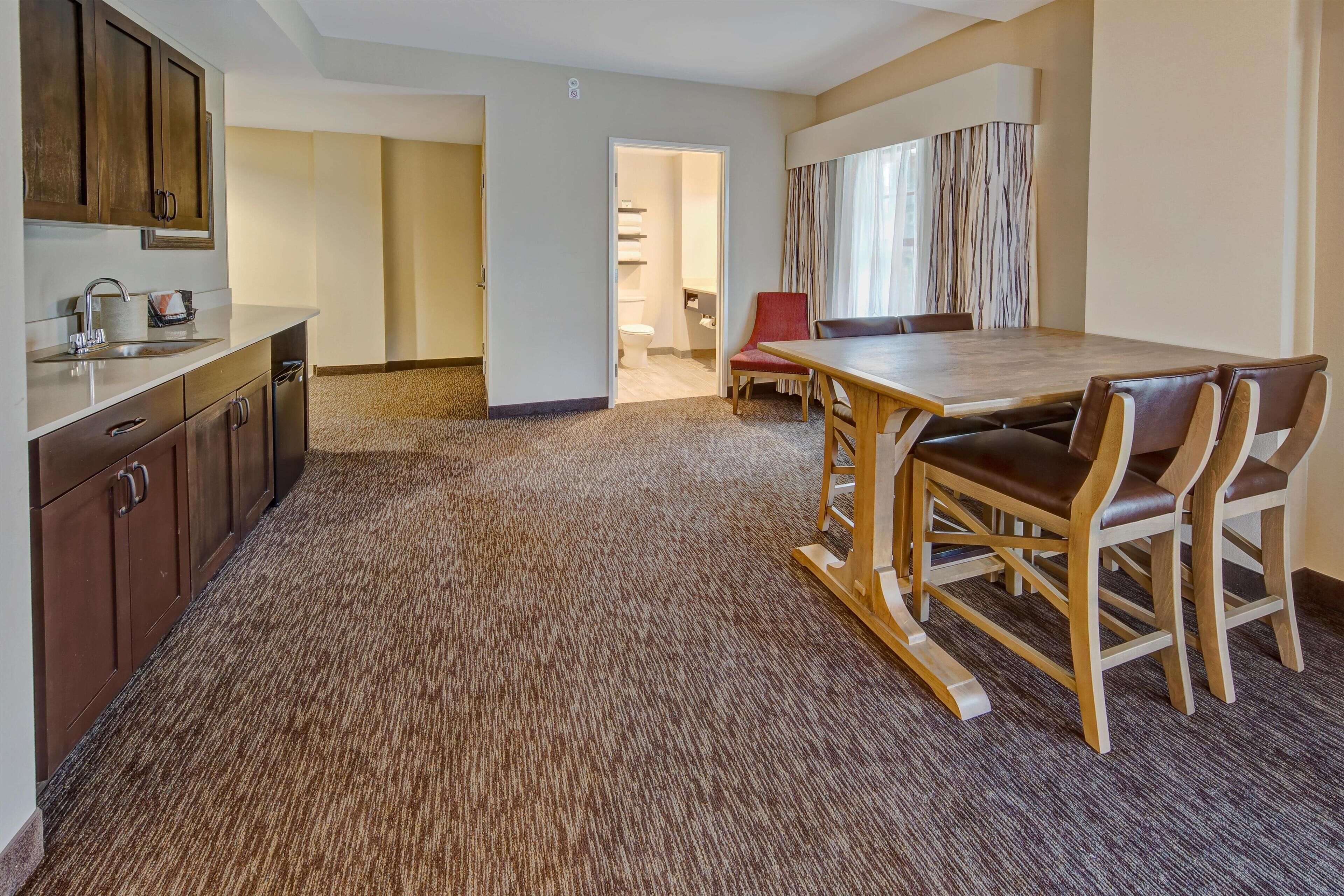 43-inch flat-screen TV with cable channels, TV, iPod dock