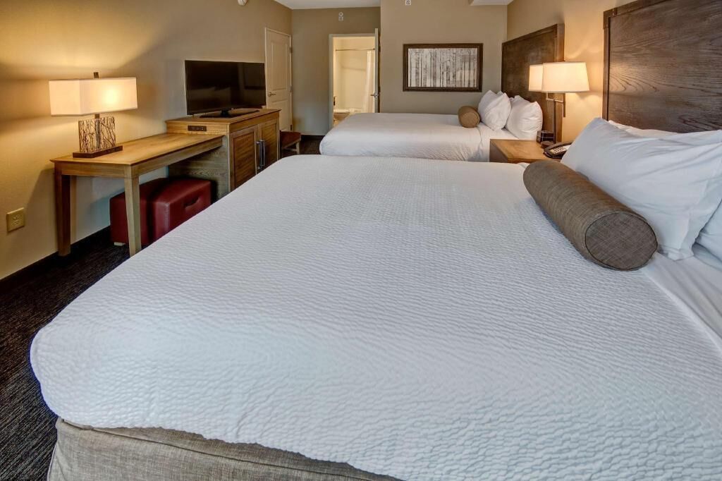 Premium bedding, blackout drapes, iron/ironing board