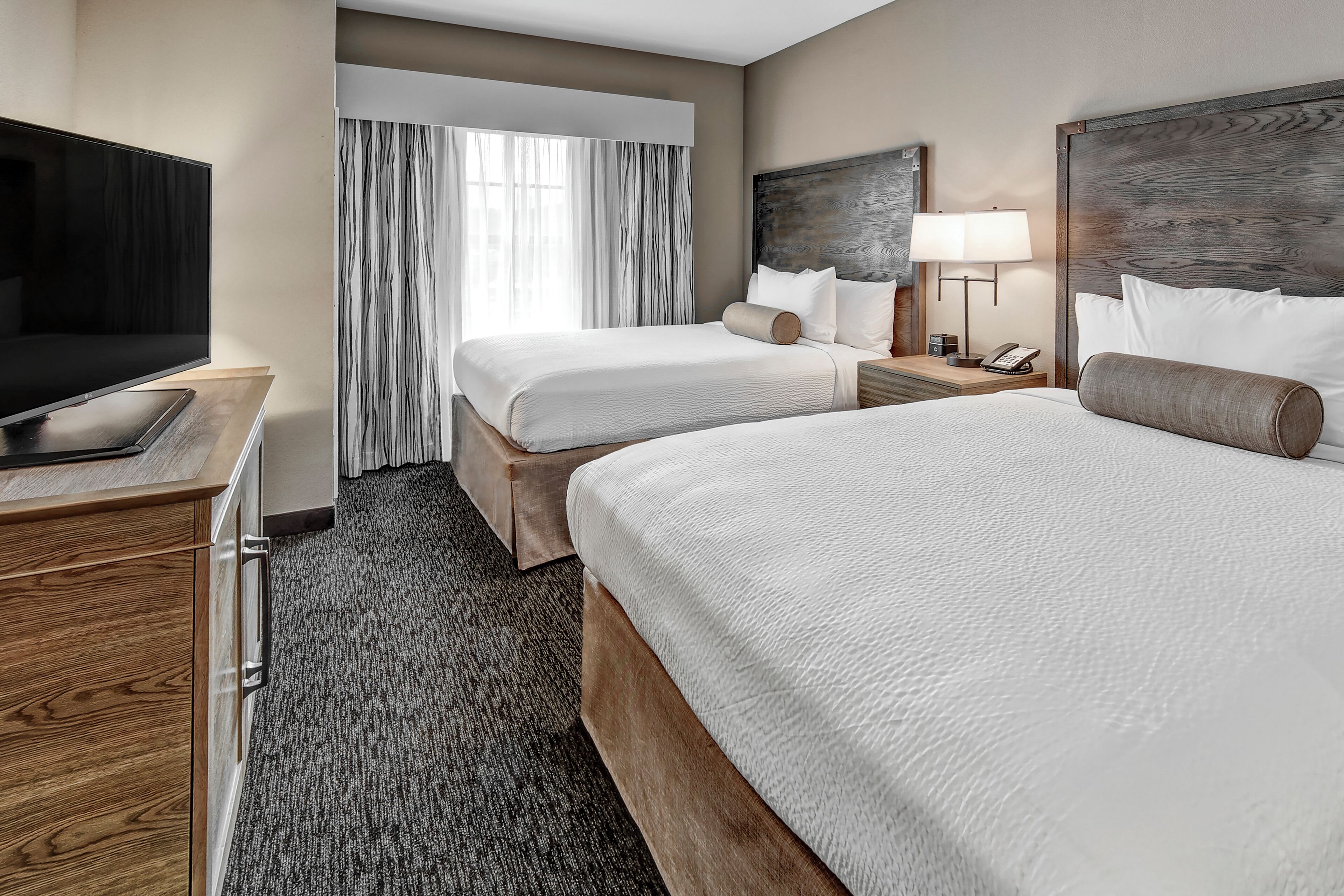 junior suite, multiple beds | premium bedding, blackout curtains, iron/ironing board