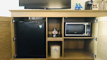 Premium bedding, blackout curtains, iron/ironing board