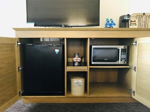 Premium bedding, blackout drapes, iron/ironing board