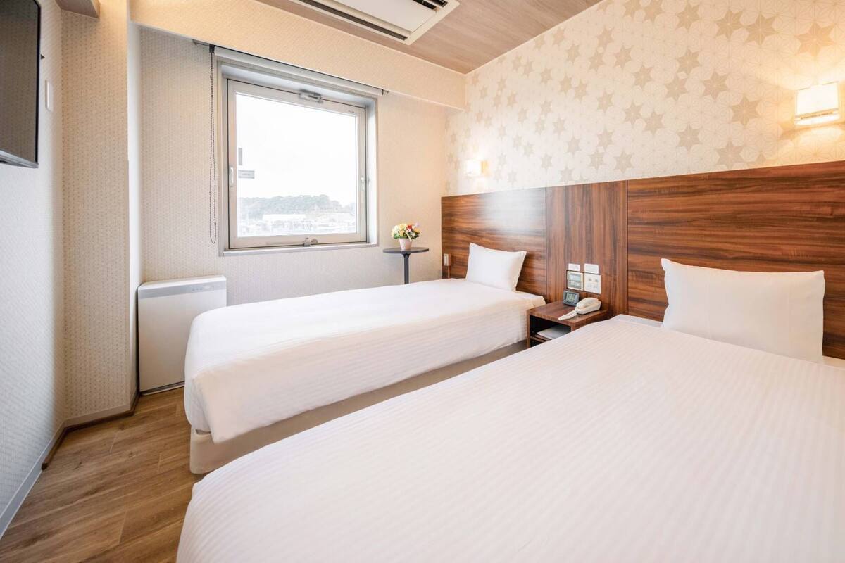 Rideaux occultants, chambres insonorisées, Wi-Fi gratuit, draps fournis