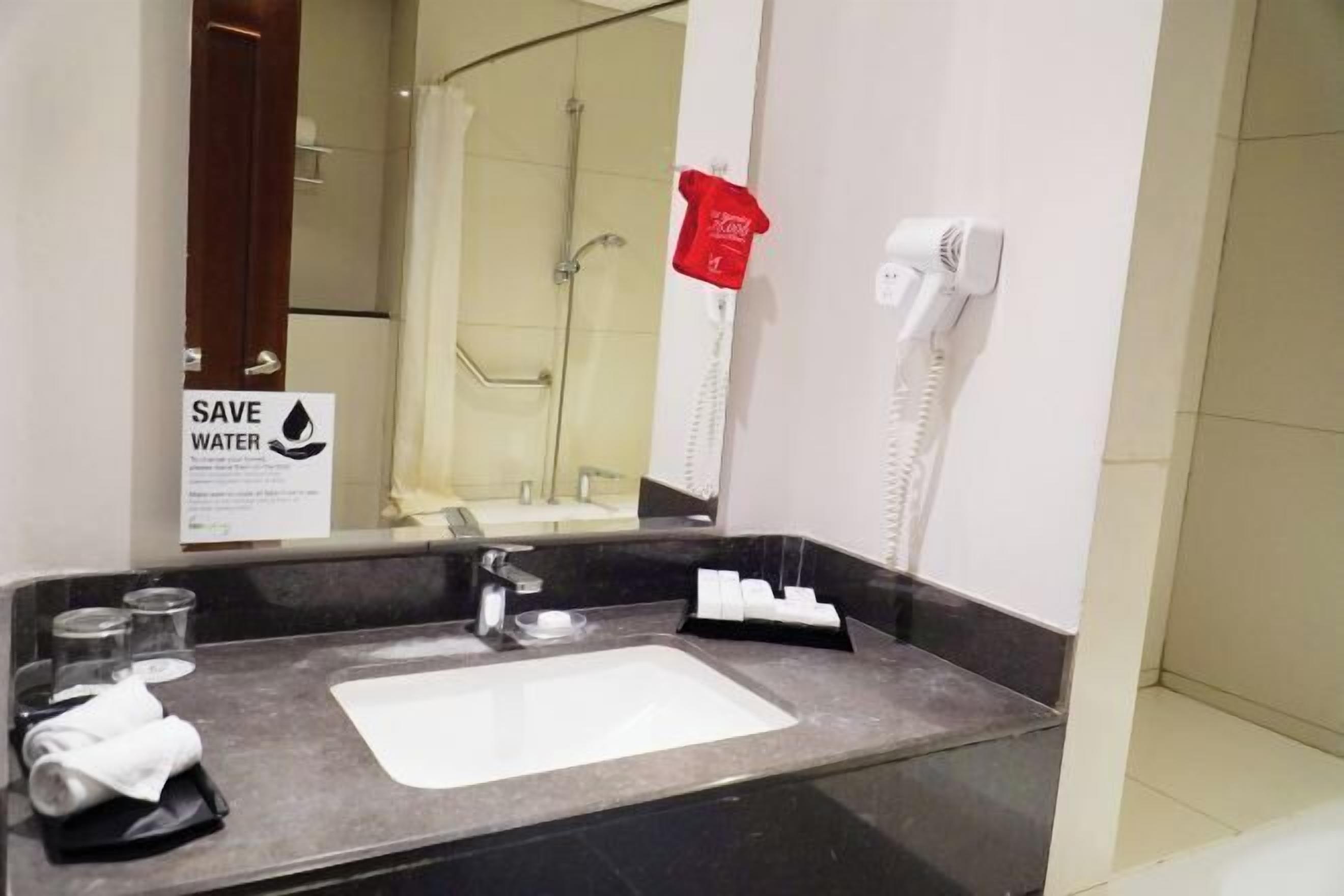 Shower, free toiletries, hair dryer, slippers