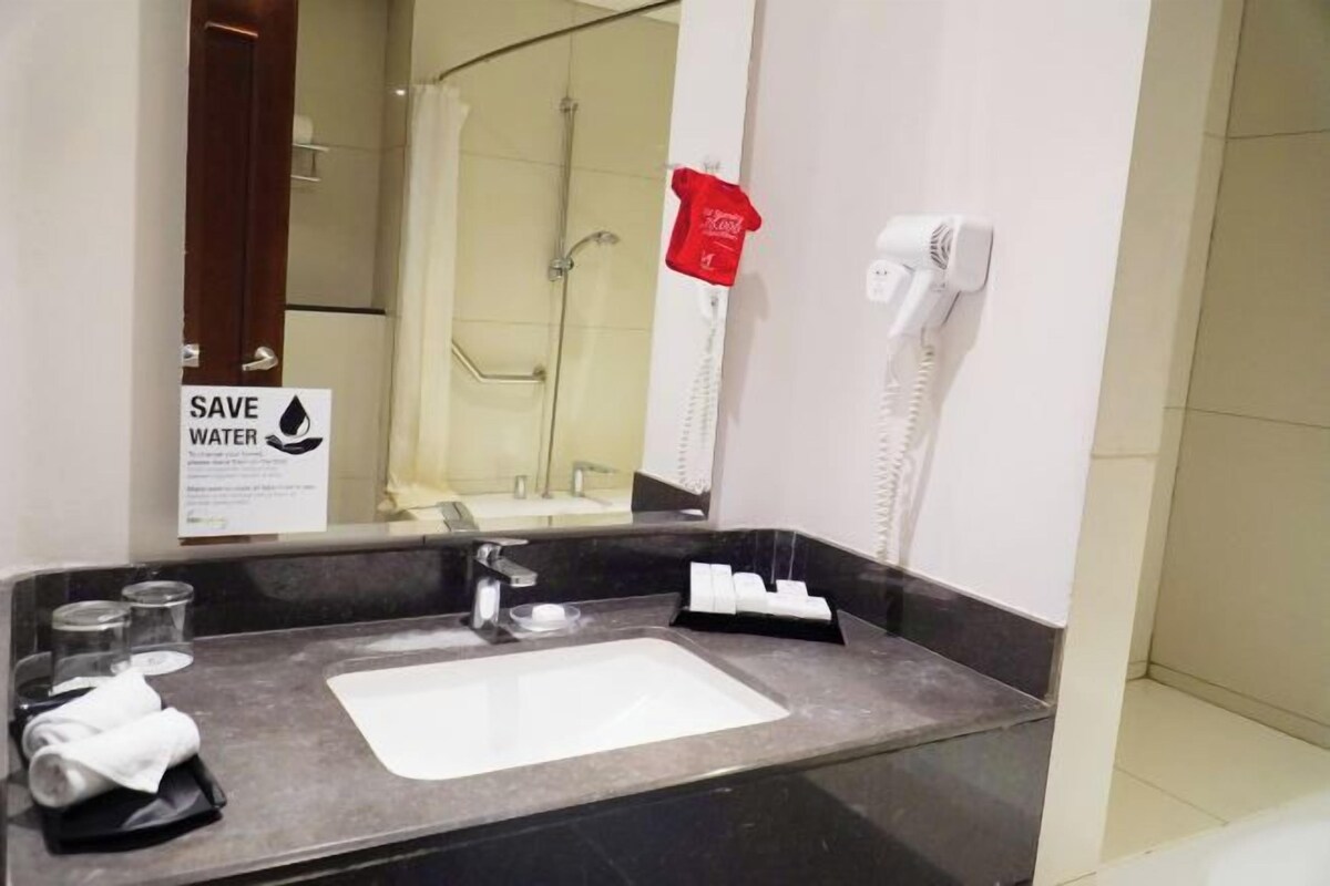 Shower, free toiletries, hair dryer, slippers