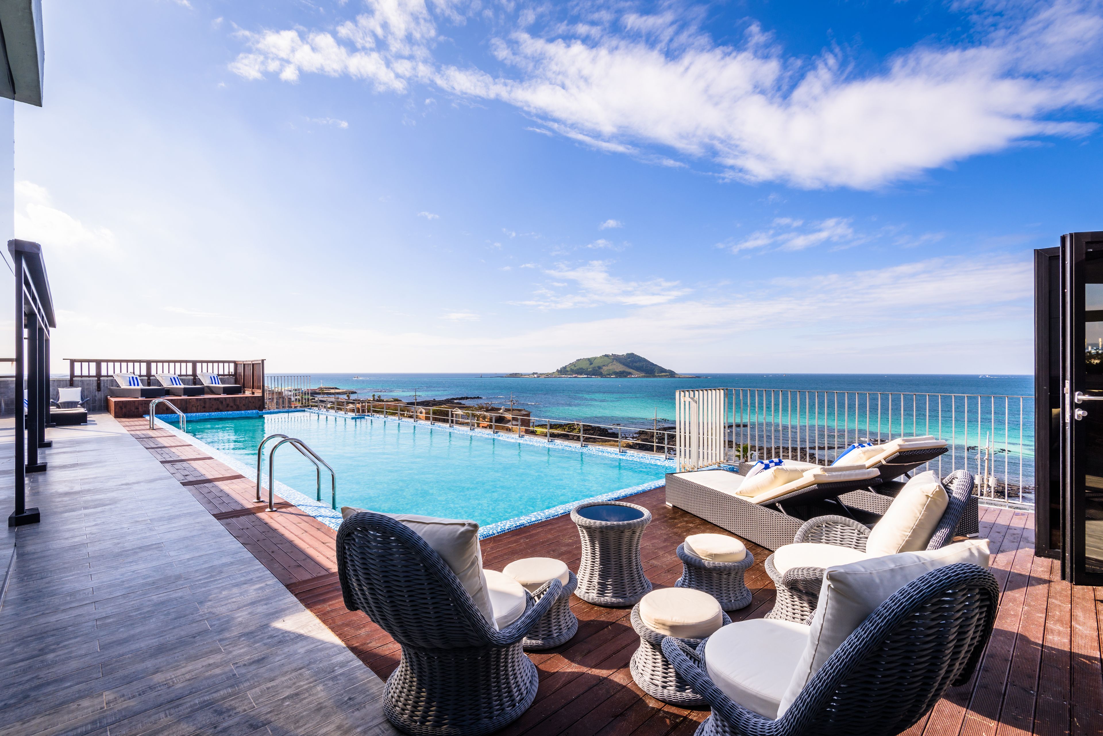 outdoor pool, open 9:00 am to 8:00 pm, pool loungers