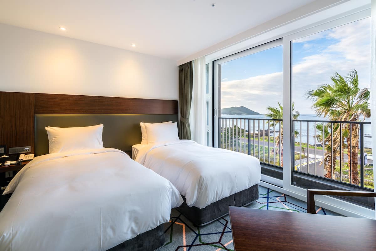 Superior Twin Room, Partial Ocean View | In-room safe, desk, blackout drapes, soundproofing