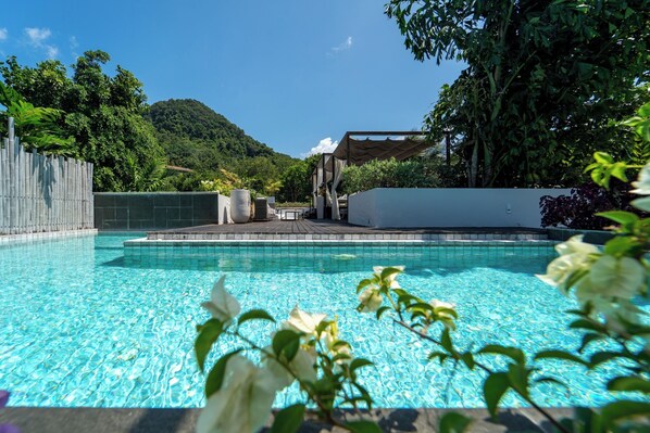 Outdoor pool, pool umbrellas, sun loungers