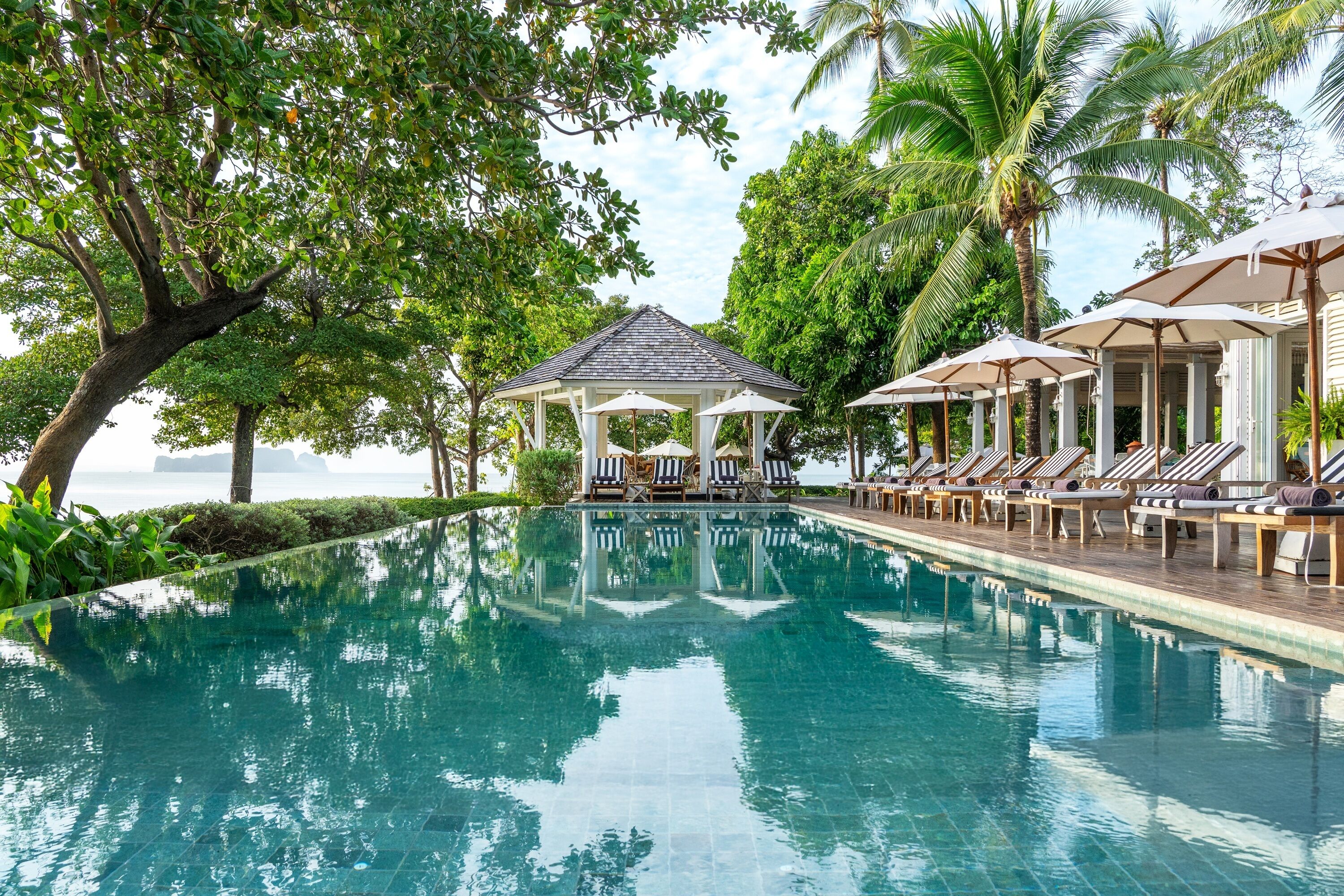 Outdoor pool, pool umbrellas, sun loungers