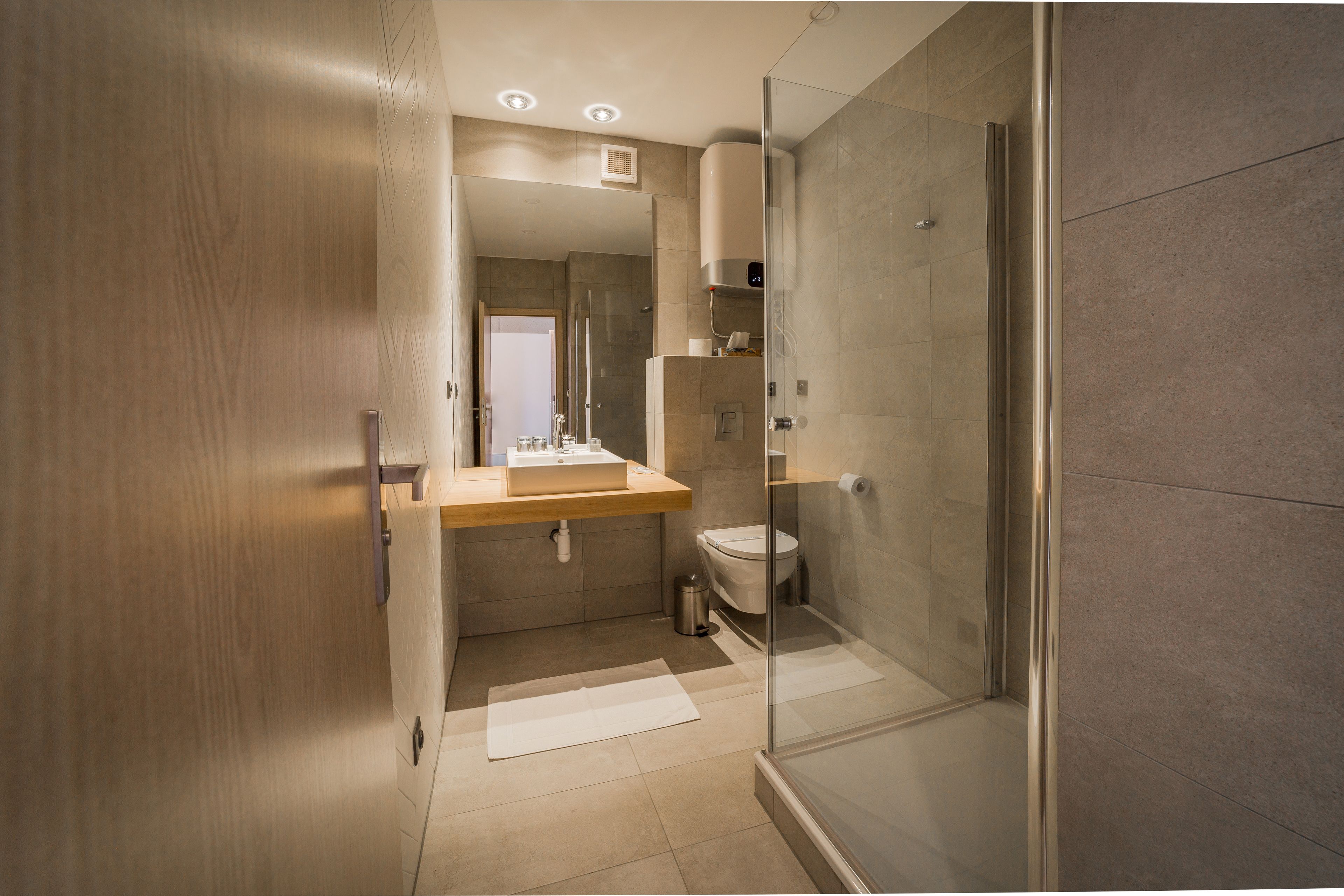 apartment deluxe with pool access | bathroom | shower, free toiletries, bathrobes, slippers