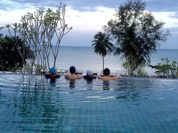 Outdoor pool, open 6:00 AM to 7:00 PM, free cabanas, pool umbrellas