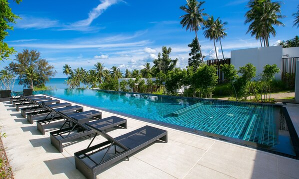 Outdoor pool, open 6:00 AM to 7:00 PM, free pool cabanas, pool umbrellas