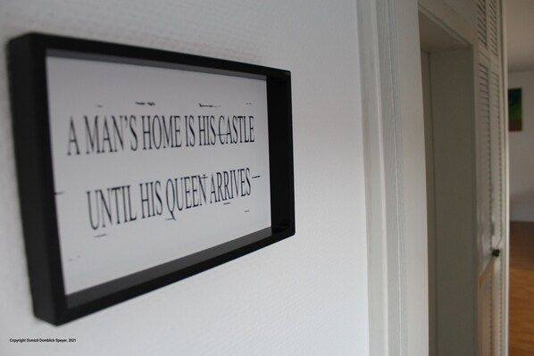 A framed quote on a wall.