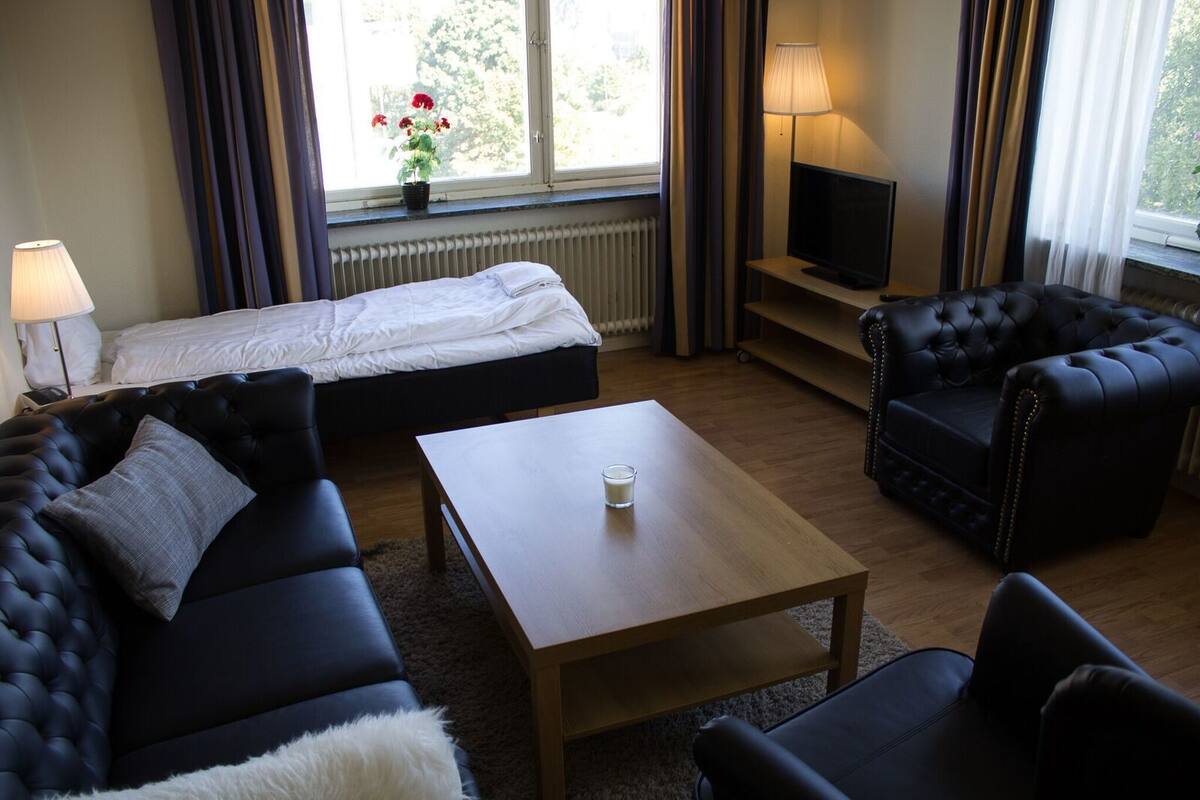 Family Apartment, 1 Bedroom, Kitchen | Living room | Flat-screen TV
