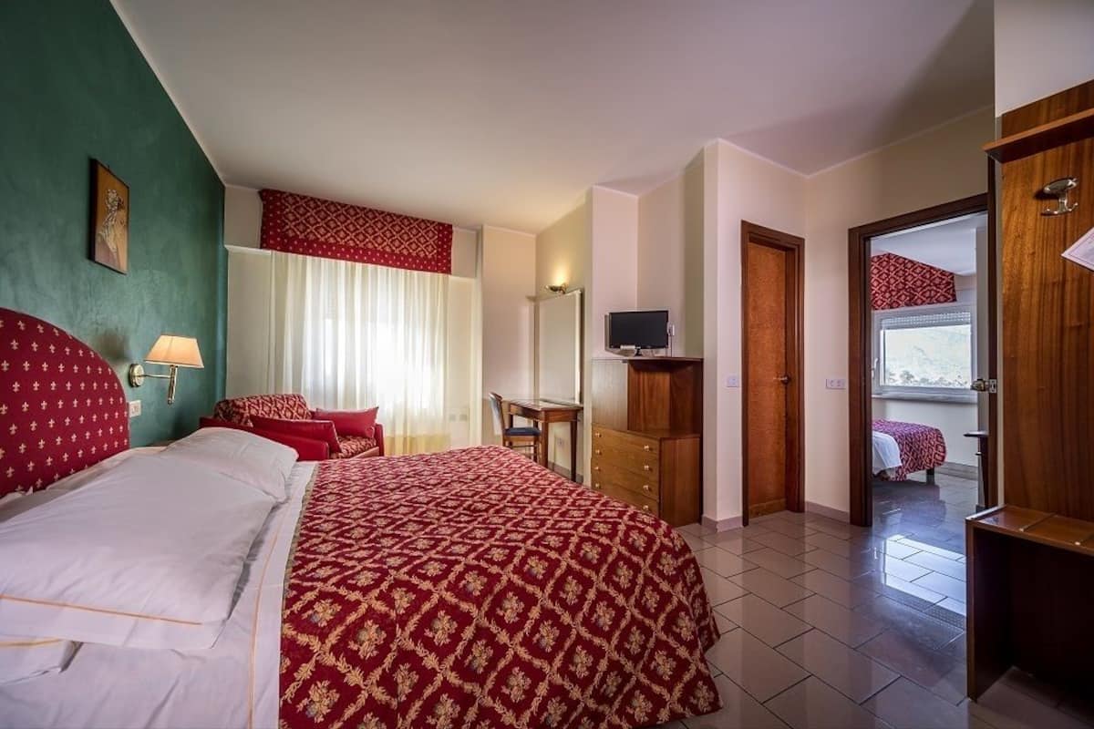 family room, 2 bedrooms | minibar, in-room safe, desk, free wifi