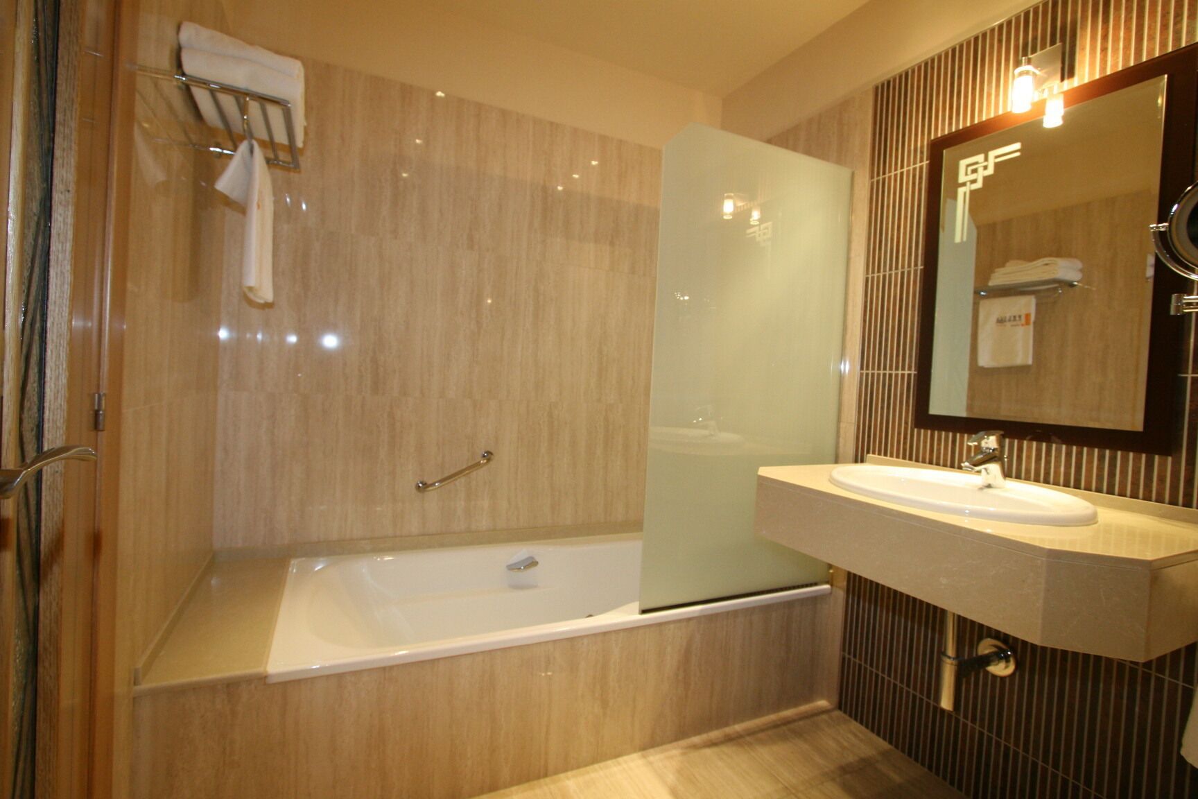 bathtub, free toiletries, hair dryer, towels