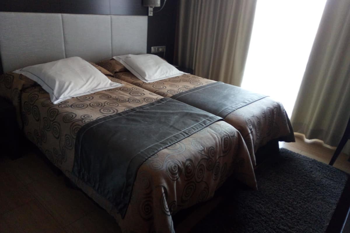 in-room safe, desk, blackout curtains, soundproofing