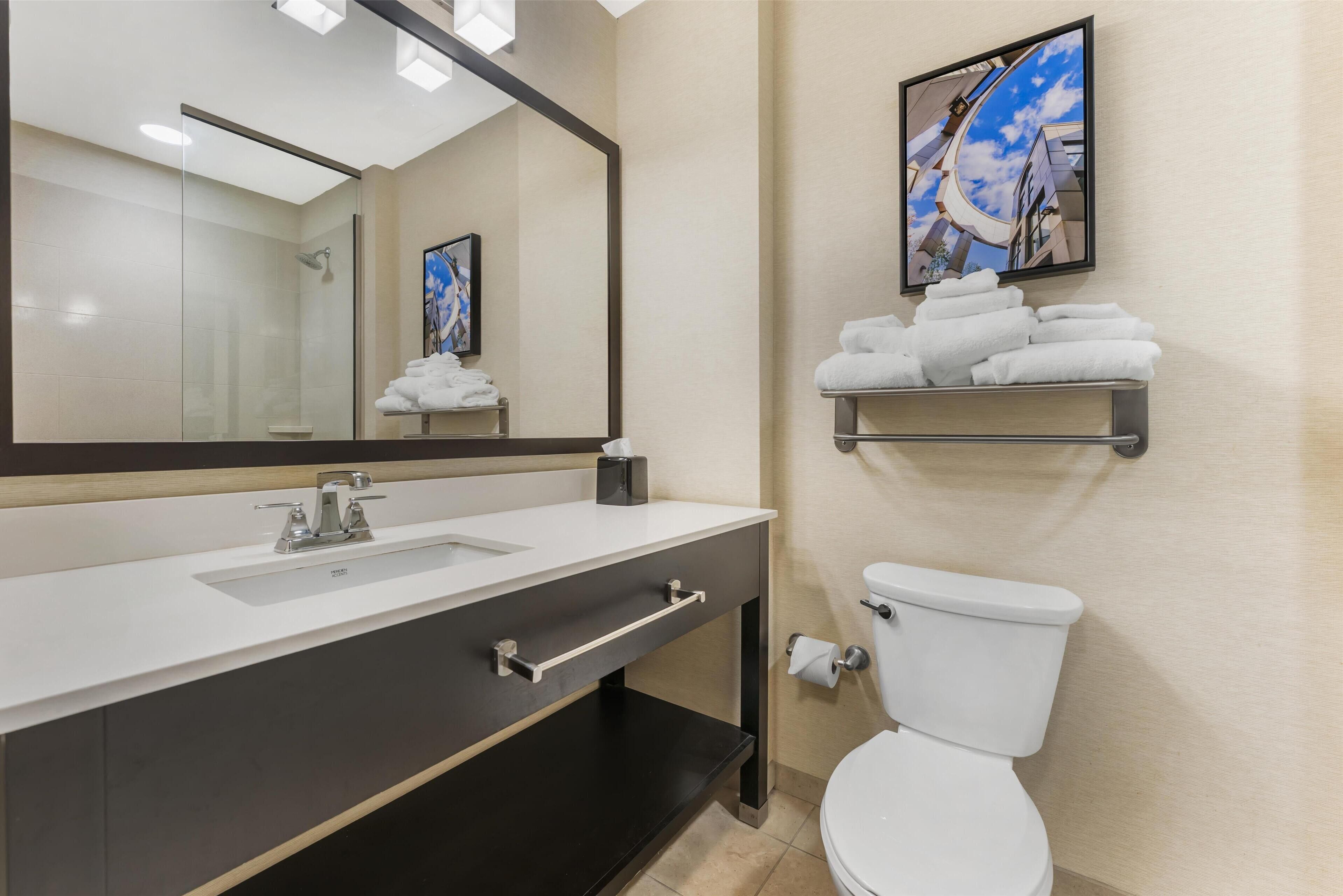 standard room, 2 queen beds, non smoking, refrigerator & microwave | bathroom | combined shower/bathtub, free toiletries, hair dryer, towels