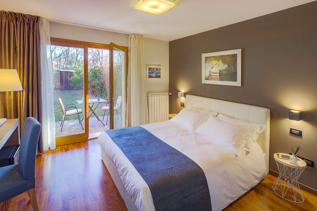 Doppia Deluxe, 1 camera da letto, bagno privato, vista giardino | Biancheria da letto di alta qualità, minibar, una cassaforte in camera