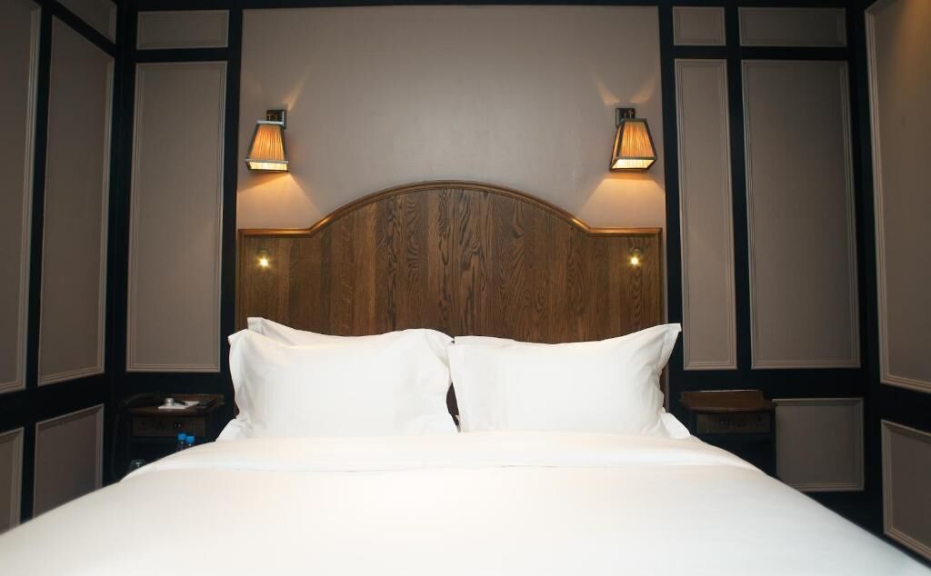 Frette Italian sheets, premium bedding, blackout drapes, soundproofing