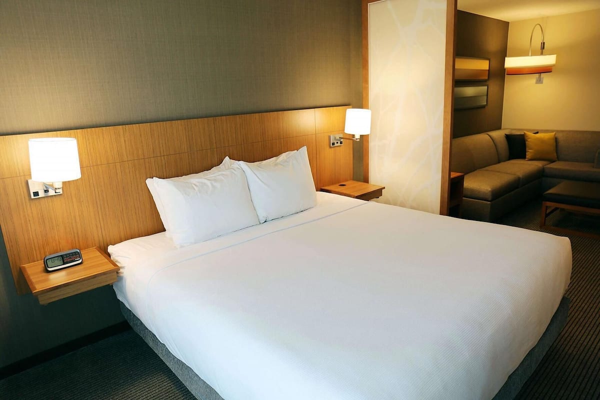 Premium bedding, down comforters, desk, laptop workspace