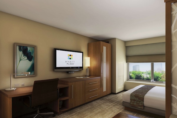 Premium bedding, down comforters, desk, laptop workspace