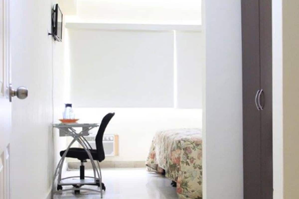 Chambre Exécutive, 1 très grand lit