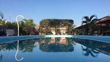 Outdoor pool, pool umbrellas, sun loungers