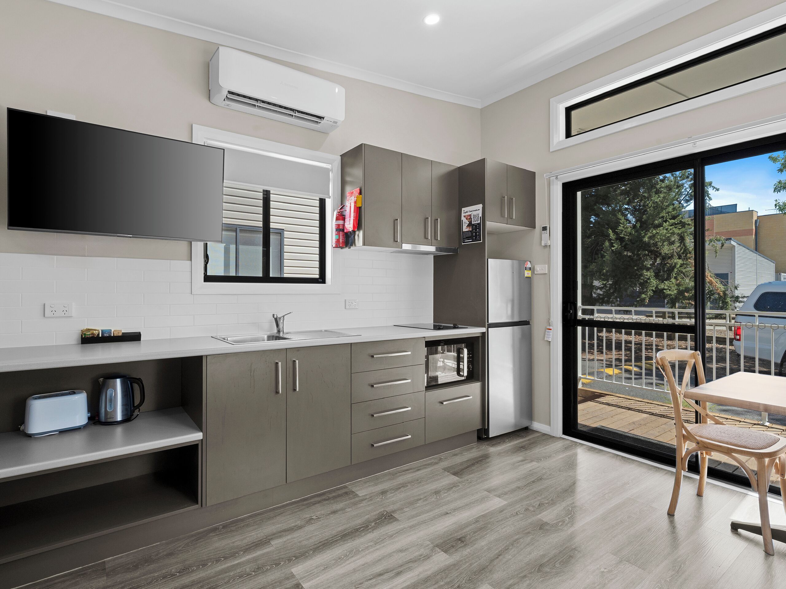 Deluxe Studio - Not Pet Friendly | Private kitchen | Shared fridge, microwave, stovetop, electric kettle
