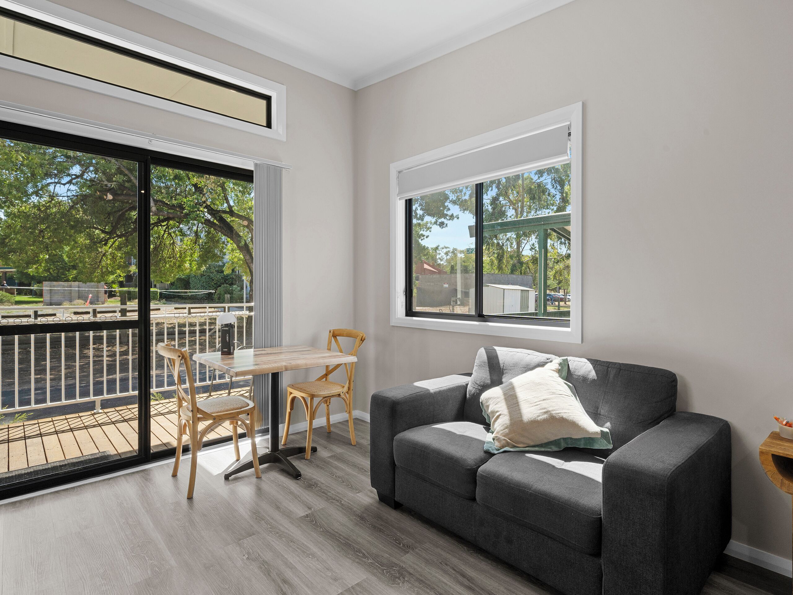 Deluxe Studio - Not Pet Friendly | Living area | TV, DVD player